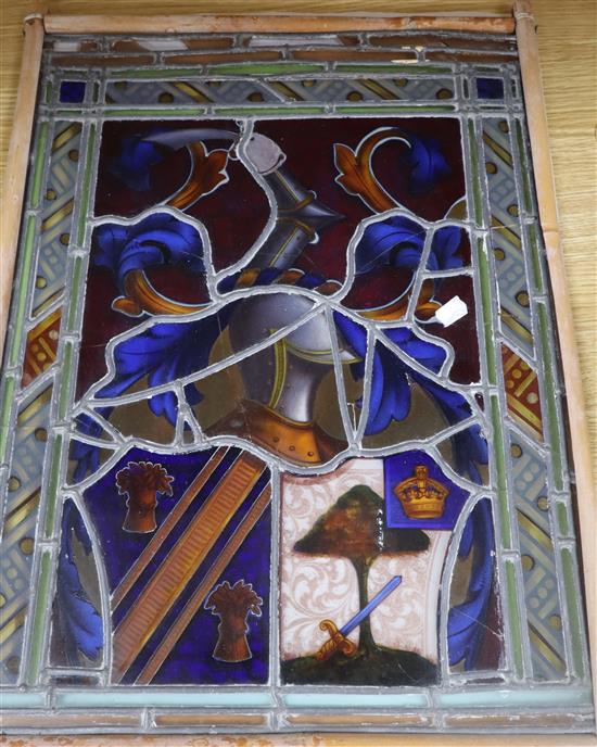 A 19th century stained glass panel in a bamboo frame 49 x 36cm